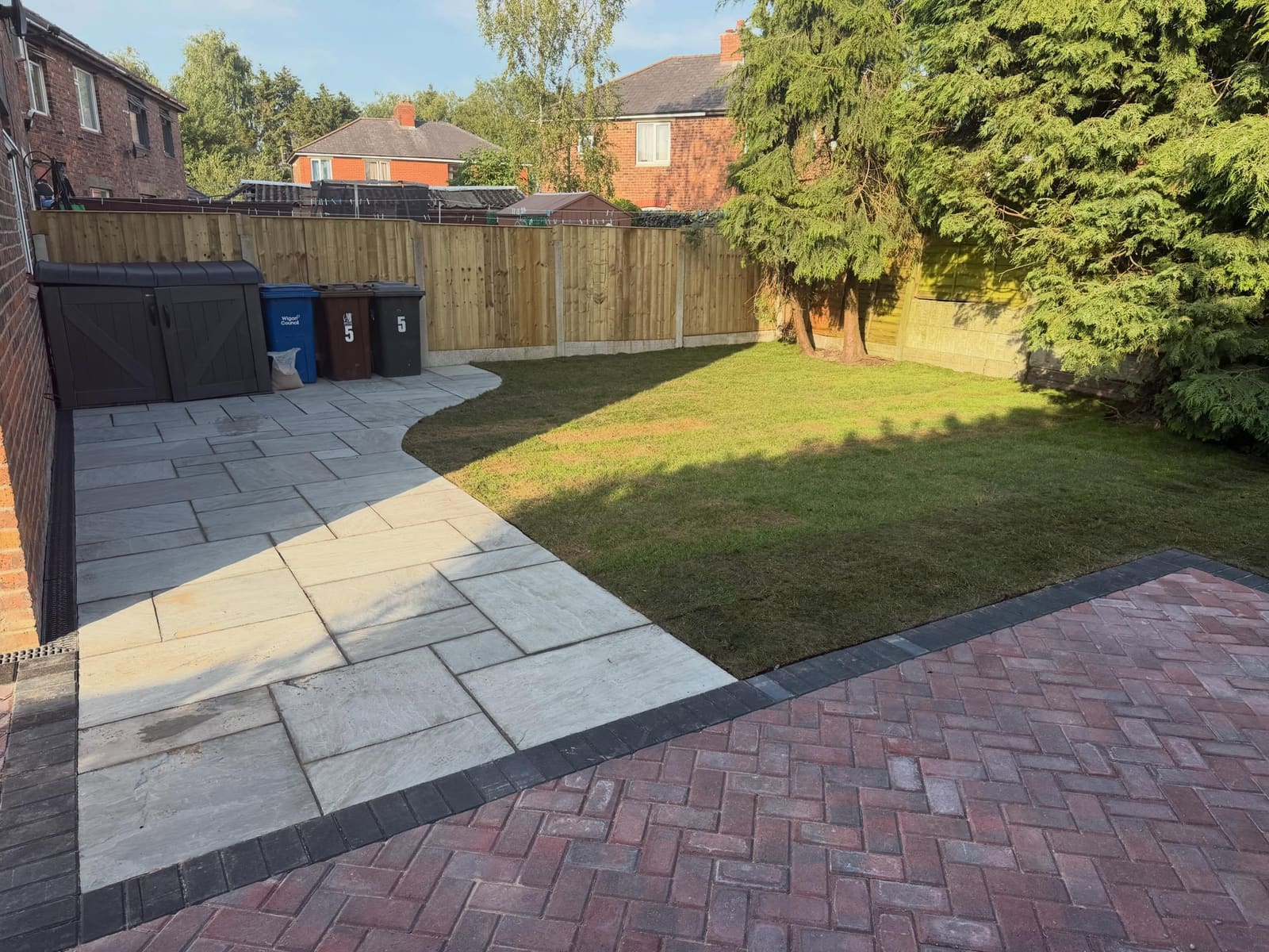 Completed patio and landscaping project by Dawn Pave LTD